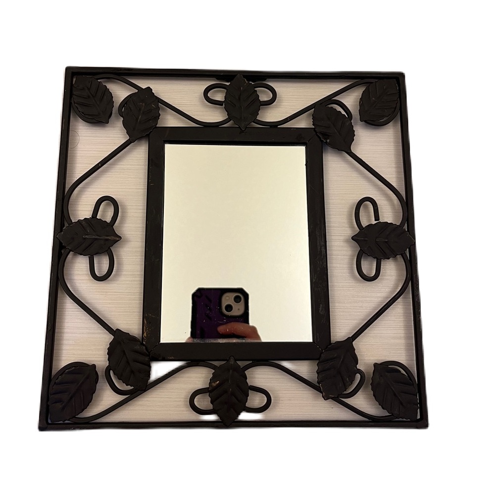 Metal mirror with leaves by home interiors